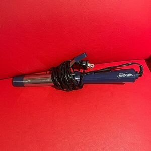 Hair curling machine